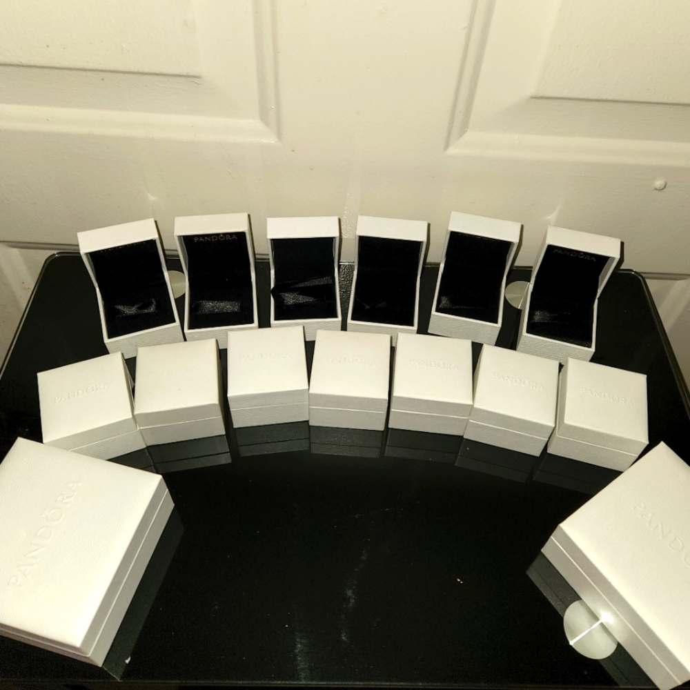 13 Pandora charm boxes and 2 white bracelet boxes (empty)